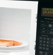 GE JVM7195SFSS 1.9 Cu. Ft. Over-the-Range Sensor Microwave Oven, Stainless Steel N4