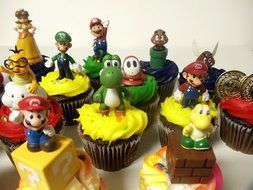 Super Mario Brothers 18 Piece Deluxe Birthday Cupcake Topper Set Featuring Shy, Mario, Goomba, Yoshi, Bomb, Luigi...