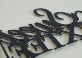 All About Details Black Sweet-sixteen Cake Topper