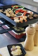 Swissmar KF-77040 Classic 8-Person Raclette Party Grill with Reversible Cast Iron Grill Plate/ Crepe Top, Black