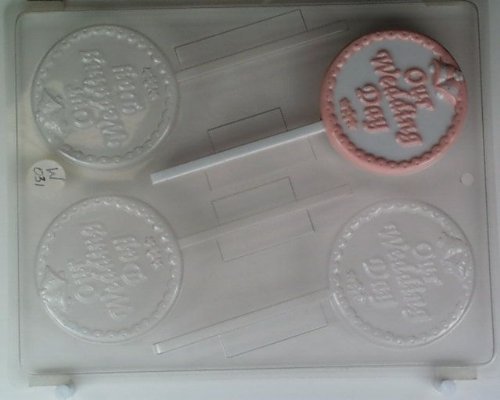 Trim, wedding bells, & Our Wedding Day on round W031 Wedding chocolate candy mold