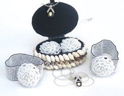 Elegant jewelry box, with 2 white beach bracelets, and Black Necklace N2
