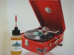 Liquid Bearings, synthetic oil for vintage phonographs and turntables, gets old tables moving again!