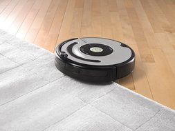 iRobot 560 Roomba Vacuuming Robot, Black and Silver