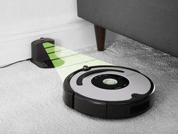 iRobot 560 Roomba Vacuuming Robot, Black and Silver N4