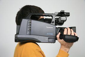 Panasonic AGHMC70PJU AVCHD 3CCD Flash Memory Professional Camcorder with 12x Optical Image Stabilized Zoom N3