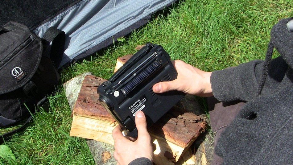 C. Crane Co COBS CC Solar Observer Wind Up Radio with AM FM Weather and built in LED Flashlight and AC Adapter