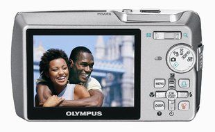 Olympus Stylus 740 7.1MP Digital Camera with Digital Image Stabilized 5x Optical Zoom (Silver) N4