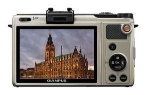 Olympus XZ-1 Digital Camera - Silver (10MP, 4x i.Zuiko Wide Optical Zoom) 3.0 inch LCD N2