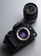 Panasonic Lumix DMC-G2 12.1 MP Live MOS Mirrorless Digital Camera with 3-Inch Touch Screen LCD and 14-42mm Lumix... N5