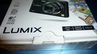 Panasonic Lumix DMC-SZ3 16.1 MP Compact Digital Camera with20x Intelligent Zoom (Black) with Panasonic USA warranty N7