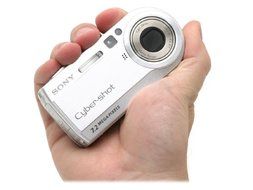 Sony DSCP150 7MP Digital Camera with 3x Optical Zoom (Silver) N4