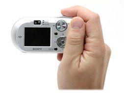 Sony DSCP150 7MP Digital Camera with 3x Optical Zoom (Silver) N5
