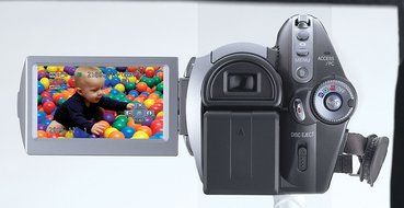 Panasonic HDC-DX1 AVCHD 3CCD High Definition DVD Camcorder with 12x Optical Image Stabilized Zoom (Discontinued... N6