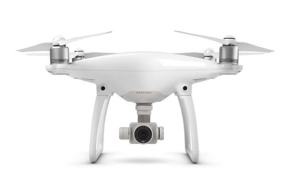 DJI Phantom 4 with Two Extra Batteries, DJI Original Phantom Backpack, Camrise Lanyard and Camrise USB Reader
