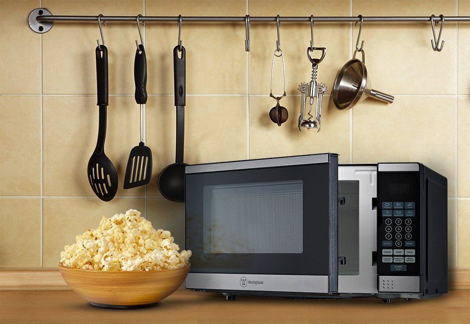 Westinghouse WCM770B 700 Watt Counter Top Microwave Oven, 0.7 Cubic Feet, Black Cabinet N8