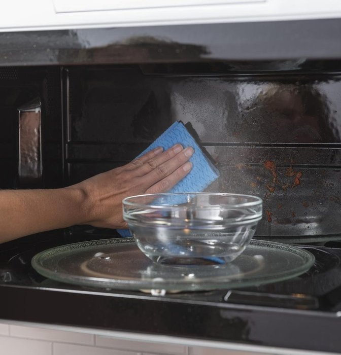 GE Profile White Over-The-Range Microwave Oven N3