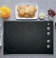 GE JP3530SJSS Built-In Knob Control Electric Cooktop, Black Ceramic Top with Stainless Steel Trim N3