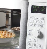 GE PVM9179DFWW Profile 1.7 Cu. Ft. White Over-the-Range Microwave - Convection N9