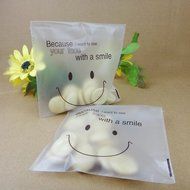 Efivs Arts 200pcs Cute Smile Face Self Adhesive Cookie Bakery Candy Biscuit OPP Plastic Bags for Bakery Party... N5