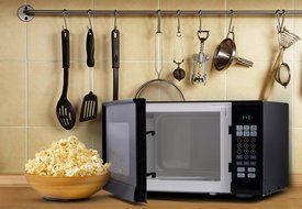 Westinghouse WM009 900 Watt Counter Top Microwave Oven, 0.9 Cubic Feet, Stainless Steel Front with Black Cabinet N17