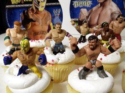 WWE 13 Piece Wrestler Rumblers Wrestling Birthday CUPCAKE Cake Topper Set Featuring 10 RANDOM WWE Rumbler Figures... N8
