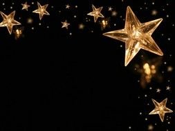 gold stars on a black background as a picture for clipart