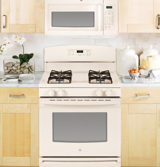 GE MICROWAVES 1029481 1000W 1.6 cu. ft. Over-The-Ran Microwave Oven, Bisque N5