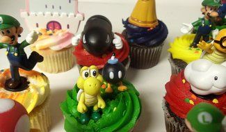 Super Mario Brothers 18 Piece Deluxe Birthday Cupcake Topper Set Featuring Shy, Mario, Goomba, Yoshi, Bomb, Luigi... N5