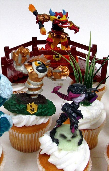 SKYLANDERS 12 Piece CUPCAKE Topper Set Featuring 6 Random Skylanders Figures and Decorative Themed Accessories... N6