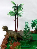 Prehistoric T-Rex DINOSAUR 12 Piece Birthday CAKE Topper Set Featuring a T-Rex and 4 Random Dinosaur Figures,... N6
