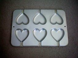 Wilton Valentine Heart Mini Cake Pan / Mold -- Makes 6 Hearts -- Pan Has Opening in Each Heart for Stick