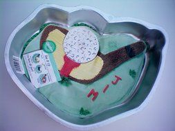 Wilton Tee It Up or Golf Club and Ball Cake Pan -- Make it a Hole in One!!! as shown Make it a hole in one with...