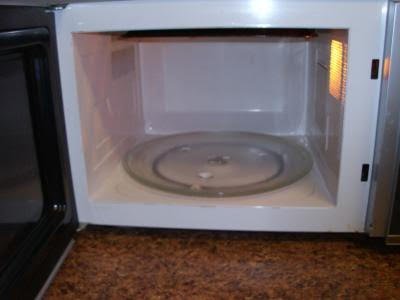 Emerson MWG9115SB 1.2 cu ft Microwave with Grill, Black N3