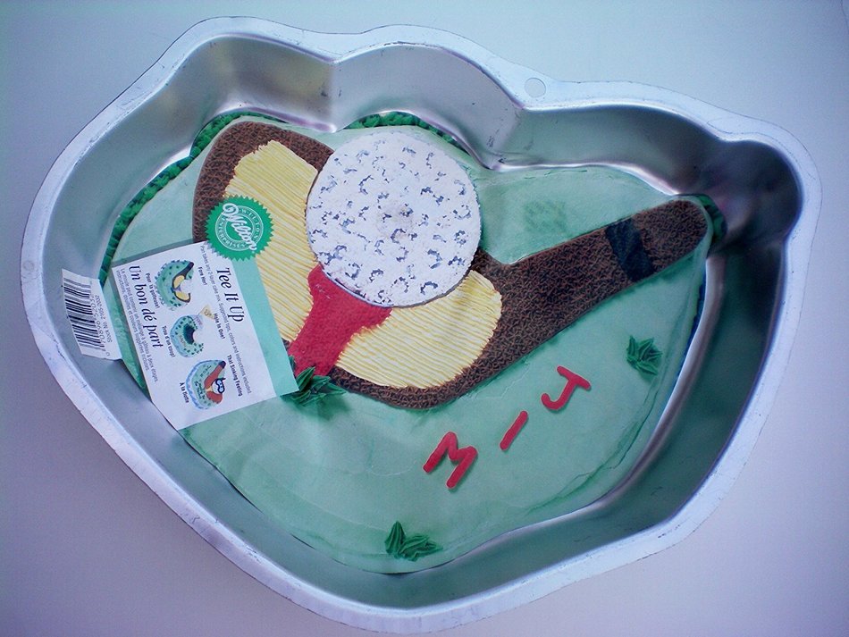Wilton Tee It Up or Golf Club and Ball Cake Pan -- Make it a Hole in One!!! as shown Make it a hole in one with...
