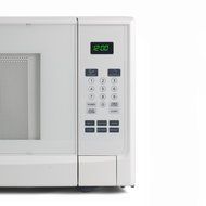 Westinghouse WCM16100W 1000 Watt Counter Top Microwave Oven, 1.6 Cubic Feet, White Cabinet N9