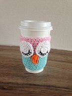 Crochet sleepy owl cup cozy in pink and light blue