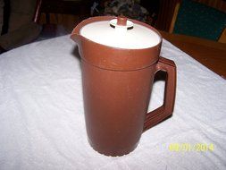 Tupperware 2qt Pitcher Brown with Cream Push Button Top