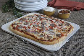Pizzacraft PC0002 15' x 12.1' Rectangle Ceramic Baking/Pizza Stone with Wire Frame N8