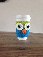 Crochet owl cup cozy in lime green and bright blue. N2