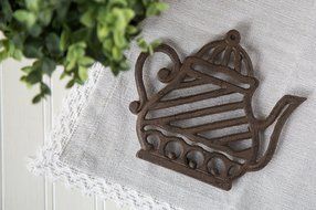 Cast Iron Trivet | Old Fashioned Tea Pot | Decorative Cast Iron Trivet For Kitchen Or Dining Table | 7x6.3 " |...