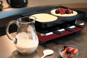 Swissmar KF-77040 Classic 8-Person Raclette Party Grill with Reversible Cast Iron Grill Plate/ Crepe Top, Black N4