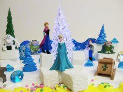 Frozen 23-Piece Elsa and Anna Birthday Cake Topper Set, Contrasting Spring Arendelle with Frozen Arendelle N6