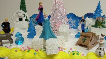 Frozen 23-Piece Elsa and Anna Birthday Cake Topper Set, Contrasting Spring Arendelle with Frozen Arendelle N9