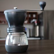 Khaw-Fee HG1B Hand Coffee Grinder with Ceramic Burr, Glass Jar and Storage Lid in Black N5