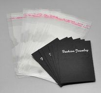 Housweety 100Sets Black Earring Display Cards 7cmx5cm W/ Self Adhesive Bags 11.5cmx6cm N3