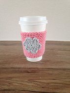 Crochet cup cozy, coffee cup sleeve, reusable coffee sleeve, coffee cup cozy in pink with a light grey flower