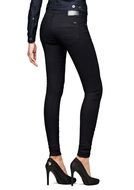 photo of Womanâs legs in Black Skinny Jeans