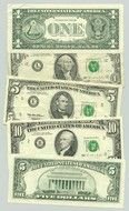 painted dollars on a white sheet