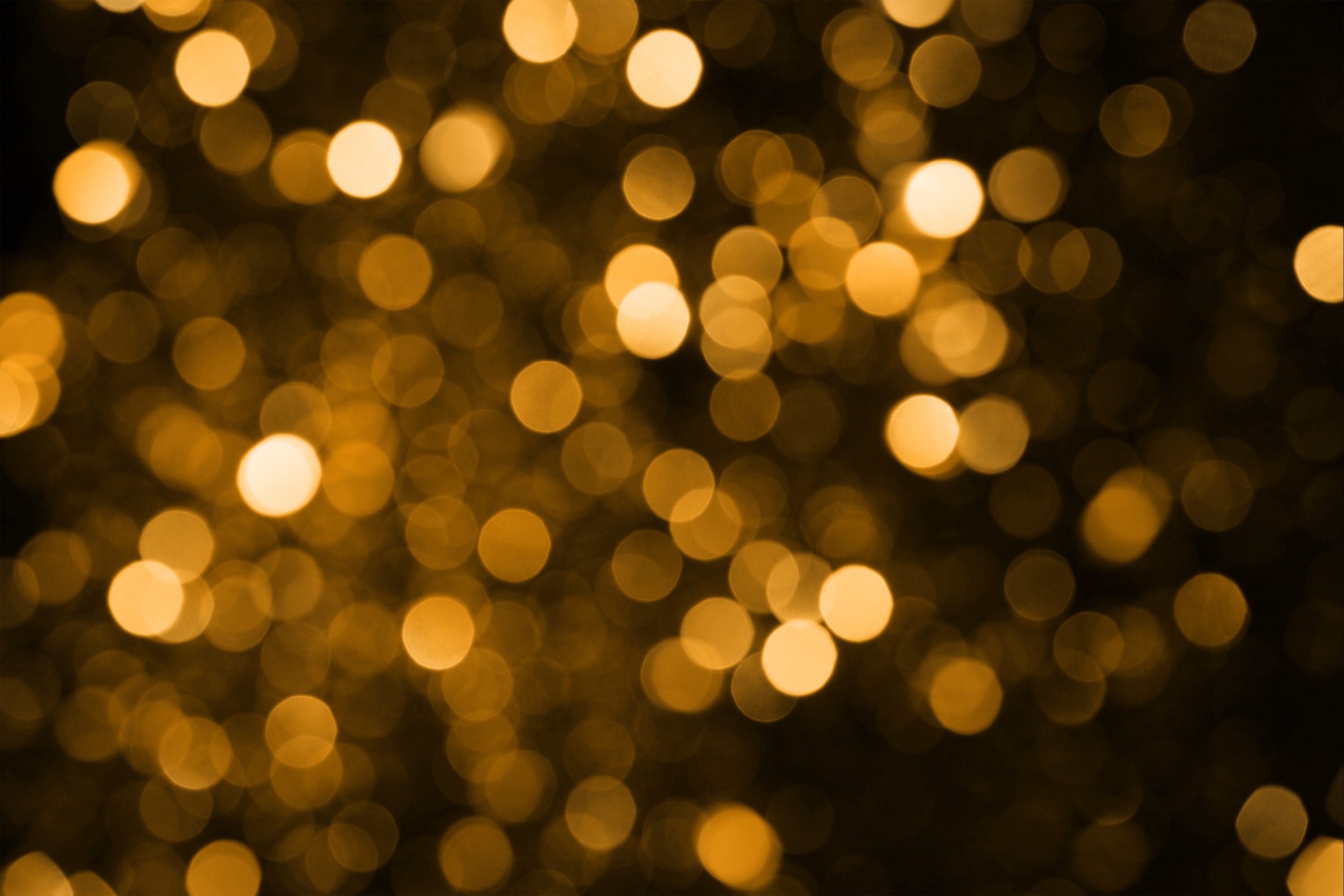 Background with golden blurred lights free image